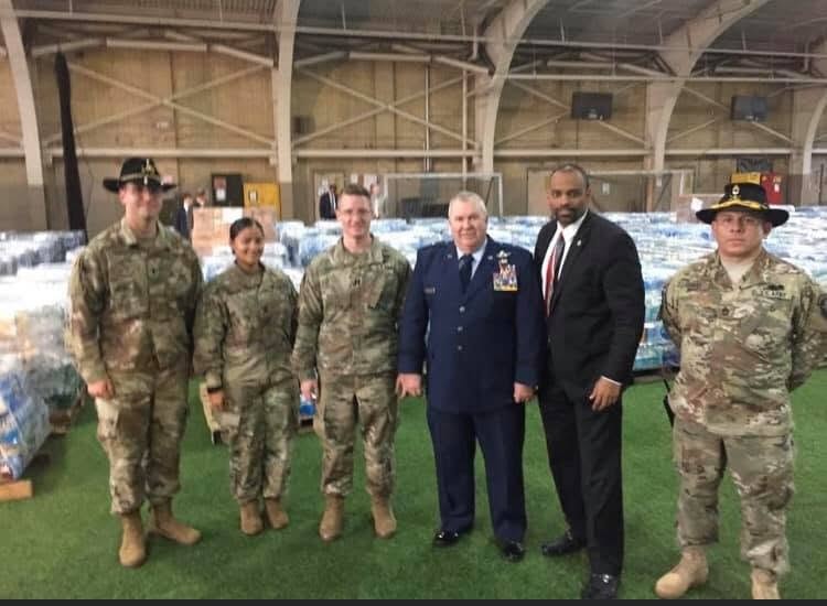 Eldridge Hawkins Jr. coordinating hurricane relief efforts with National Guard and Air Force personnel